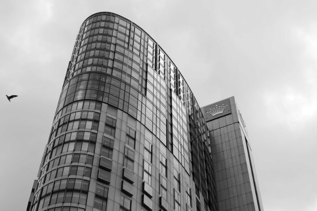 grayscale photography of highrise building